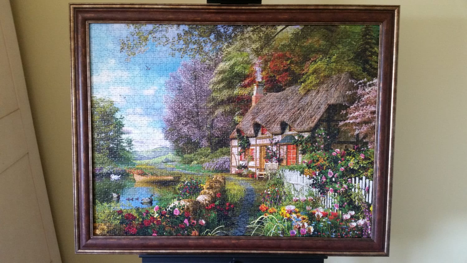 Professionally Framed 1500pc Completed Ravensburger Country Cottage Puzzle Wall Art.