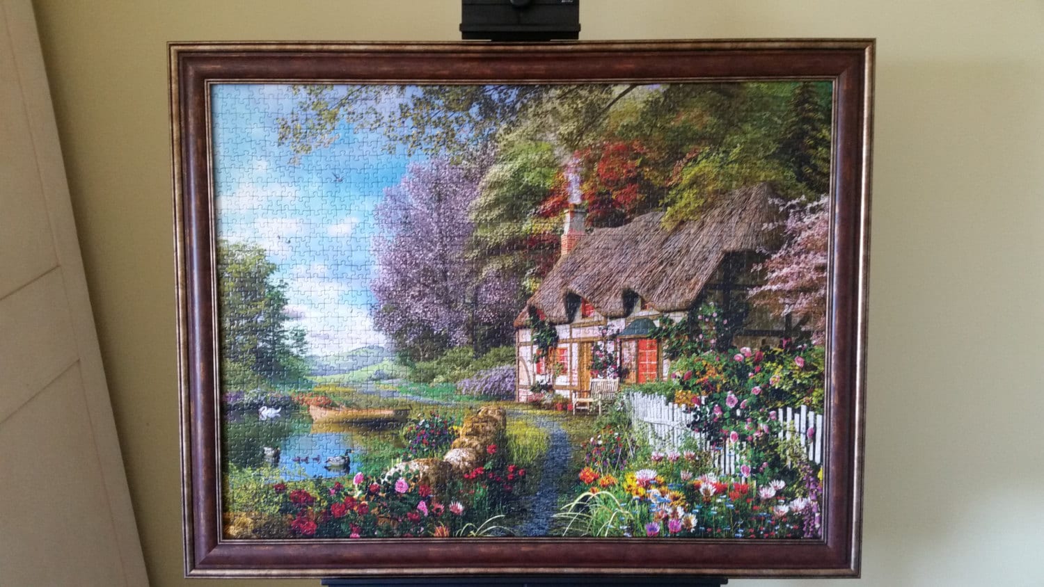 Professionally Framed 1500pc Completed Ravensburger Country Cottage Puzzle Wall Art.