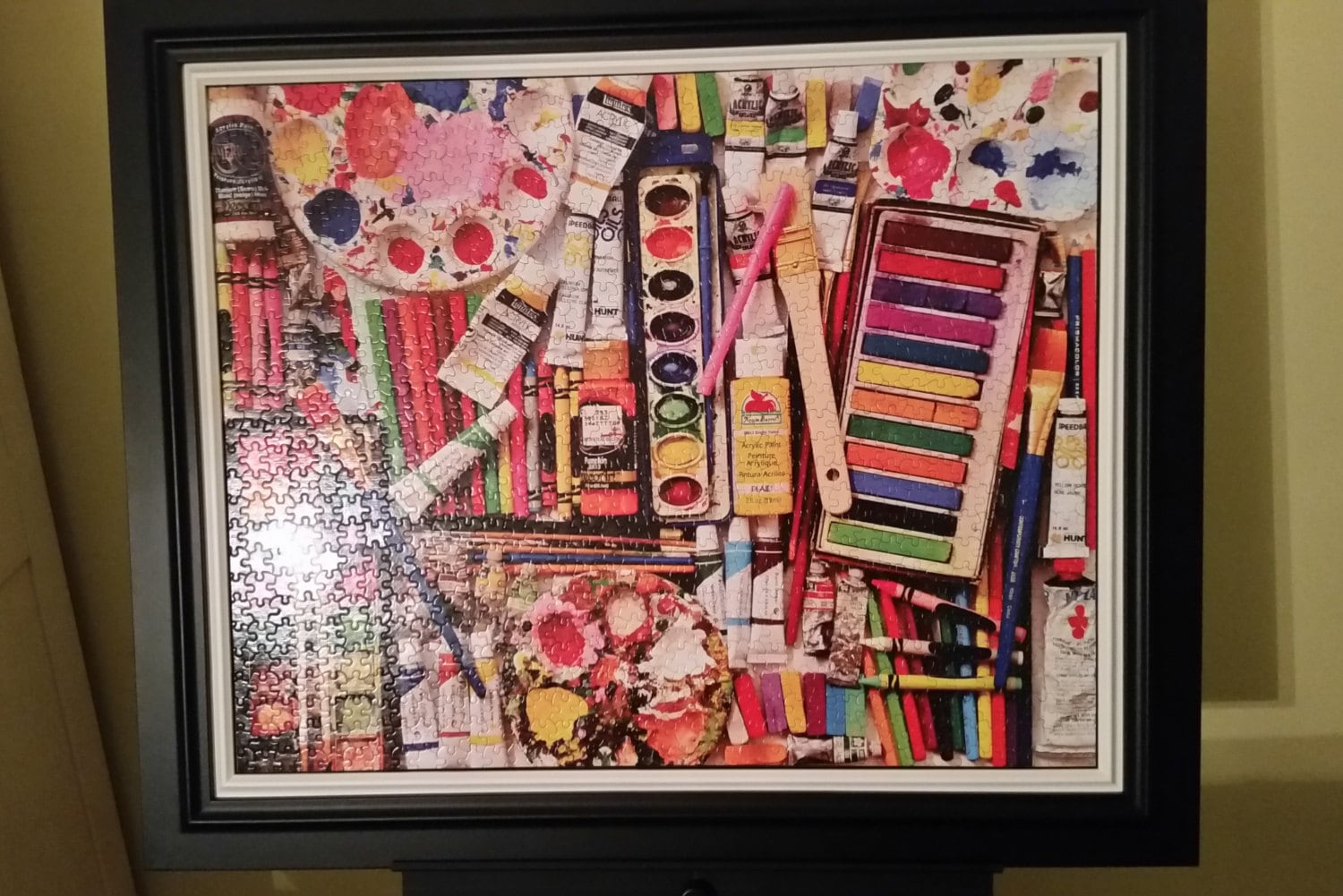 Professionally Framed 1000 piece Art Supplies Puzzle Wall Art & Wall Decor. Medium sized picture with gloss finish.